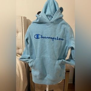 Champion sweater with hood, size Boys Large.